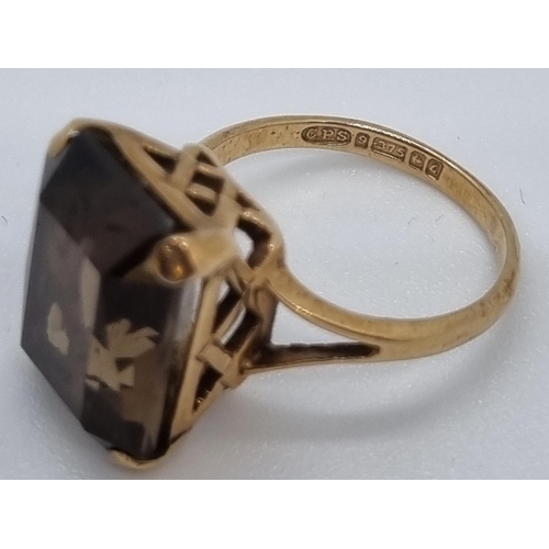 215 - 9ct gold and smoky quartz dress ring, Birmingham hallmarks.  5.7g approx.  Size N1/2.   (B.P. 21% + ... 