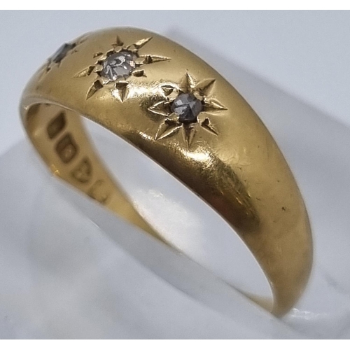 231 - 18ct gold and diamond three stone ring.  3g approx.  Size M.  (B.P. 21% + VAT)