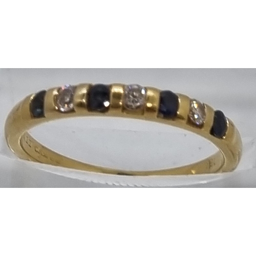 232 - 18ct gold diamond and sapphire seven stone ring.  2.3g approx.  Size L.   (B.P. 21% + VAT)