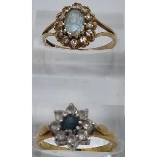 233 - 9ct gold blue and clear stone cluster dress ring. 2.3g approx.  Size O, together with a gold plated ... 