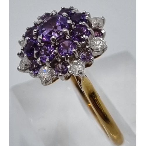 240 - 18ct gold diamond and probably tanzanite multi cluster ring comprising a total of eight diamonds.  6... 