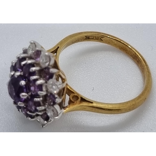 240 - 18ct gold diamond and probably tanzanite multi cluster ring comprising a total of eight diamonds.  6... 