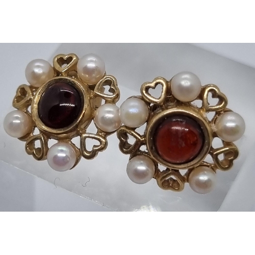 242 - Pair of 9ct gold pearl and garnet earrings.   (B.P. 21% + VAT)