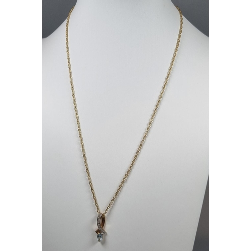 247 - 9ct gold diamond and Topaz pendant on 9ct gold chain.  3.7g approx.   (B.P. 21% + VAT)