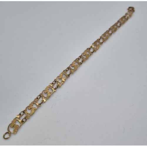 250 - 9ct gold ladies bracelet with pierced repeating design.  3.4g approx.  (B.P. 21% + VAT)