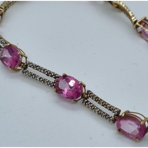 251 - 9ct gold pink nine stone bracelet.  7.7g approx.   (B.P. 21% + VAT)