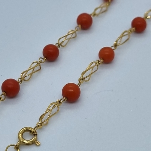 255 - 18ct gold and coral necklace.  12.5g approx.   (B.P. 21% + VAT)