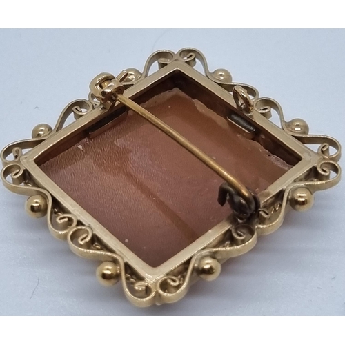 258 - Good quality 9ct gold ornately framed cameo brooch of square form.   (B.P. 21% + VAT)