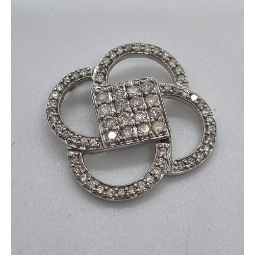 260 - White gold and modernist multi-cluster diamond pendant, the square centre with sixteen diamonds.  2.... 