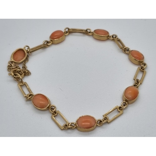 261 - 9ct gold and coral bracelet.  7.9g approx.   (B.P. 21% + VAT)