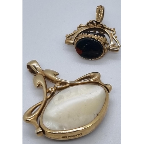 265 - Art Nouveau design 9ct gold revolving hard stone fob together with another 9ct gold blood stone fob ... 