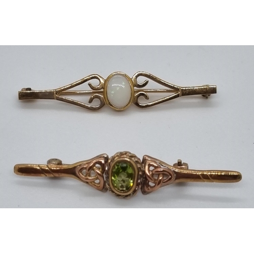 268 - 9ct gold opal bar brooch together with a 9ct gold peridot bar brooch.  6.4g approx.  (2)   (B.P. 21%... 