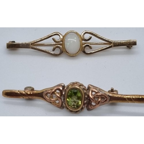 268 - 9ct gold opal bar brooch together with a 9ct gold peridot bar brooch.  6.4g approx.  (2)   (B.P. 21%... 