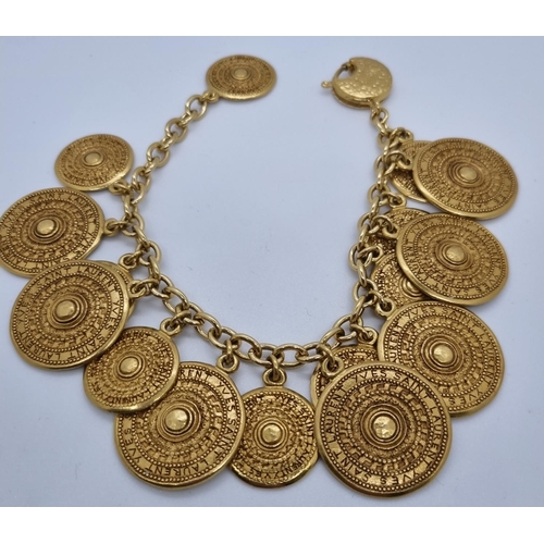 271 - Yves Saint Laurent gold finish gypsy coin bracelet.   (B.P. 21% + VAT)