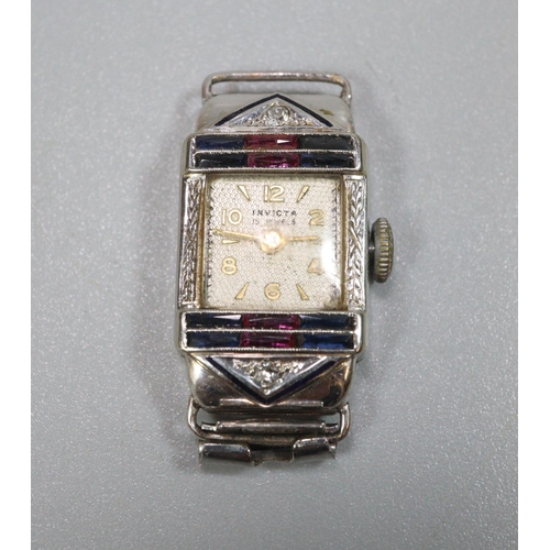 281 - Small white metal Grand Prix Election  Art Deco design ladies dress watch with stone set surround to... 