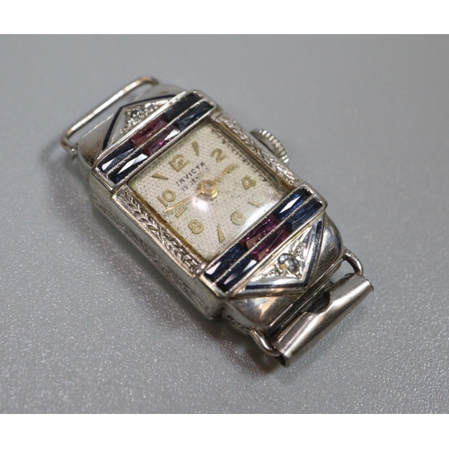 281 - Small white metal Grand Prix Election  Art Deco design ladies dress watch with stone set surround to... 