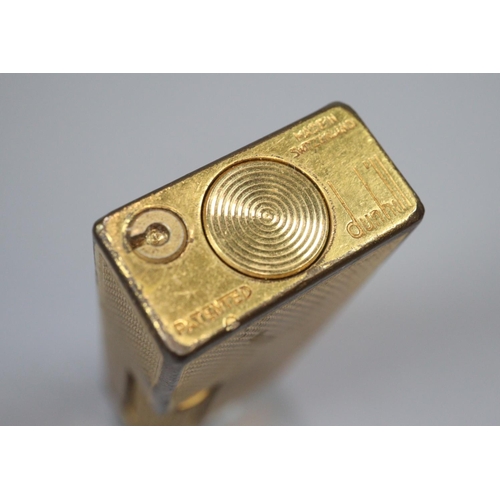 286 - Mid century Dunhill gilded brass cigarette lighter.  (B.P. 21% + VAT)