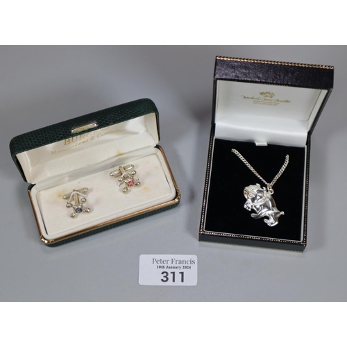 311 - Silver British bulldog pendant and chain and a pair of silver cufflinks in the form of taps.   (B.P.... 