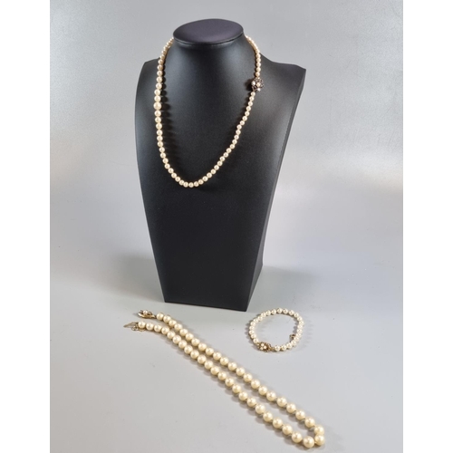 322 - Collection of pearl jewellery with silver and 9ct gold clasps, two necklaces and a bracelet.  (B.P. ... 