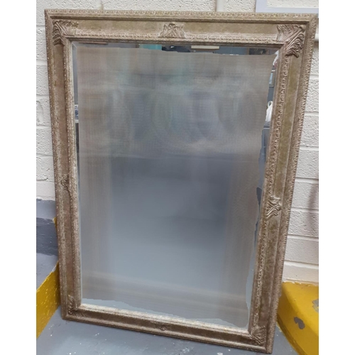 409 - Modern bevel plate and moulded framed mirror. 110 x 78cm approx. 
(B.P. 21% + VAT)