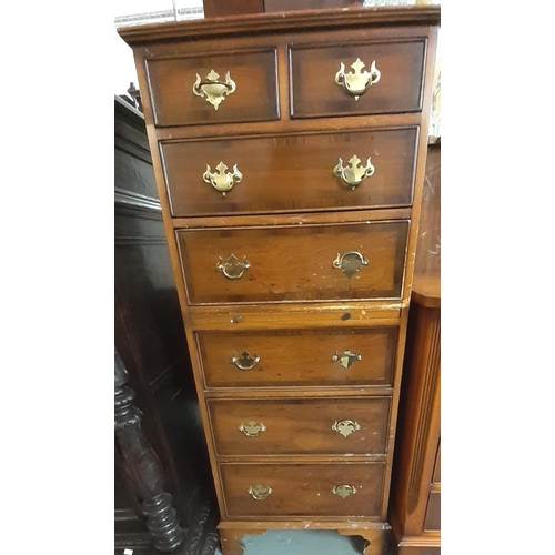 455 - Reproduction yew wood sideboard with an arrangement of nine drawers together with a reproduction nar... 