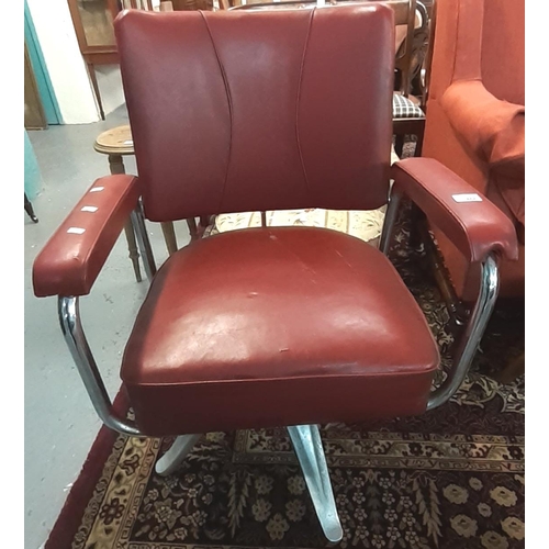 466 - Mid century barber's swivel armchair, on a chrome base.  (B.P. 21% + VAT)