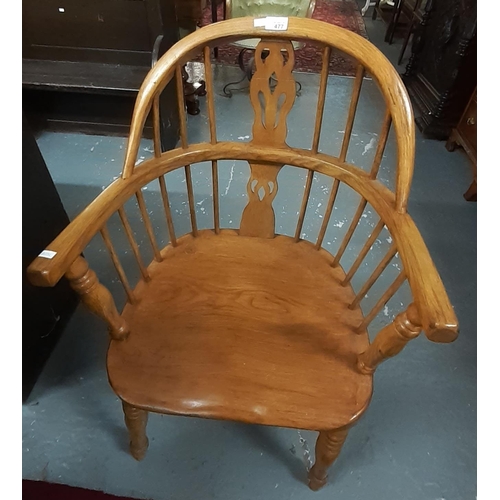 477 - 19th century style oak spindle and slat back Windsor chair on moulded seat with crinoline stretcher ... 