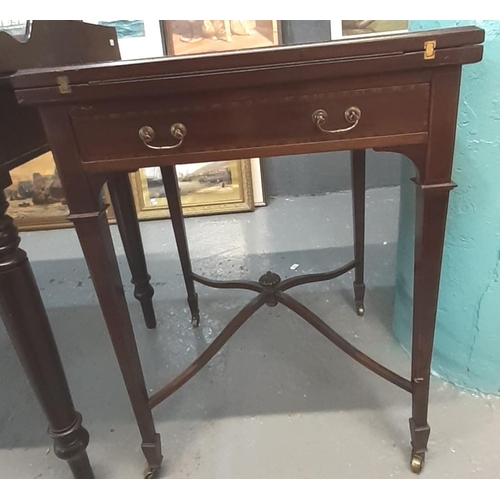 485 - Edwardian mahogany inlaid and herringbone design envelope folding swivel card table on X stretcher s... 