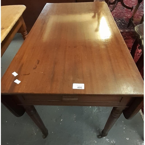 495 - 19th century mahogany Pembroke table on ring turned tapering legs and casters.  (B.P. 21% + VAT)