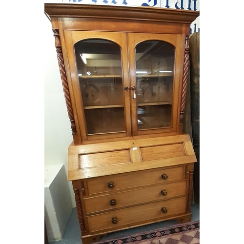 497 - Late Victorian oak bureau bookcase, the moulded cornice above two glazed doors, the interior reveali... 