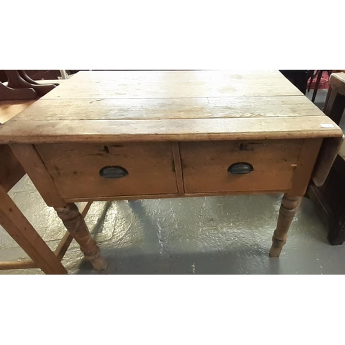 510 - Late Victorian rustic pine two drawer kitchen/side table with single drop flap on baluster turned le... 