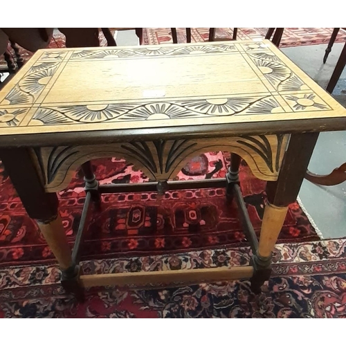 519 - Stripped and stained oak carved side table with shaped frieze.   (B.P. 21% + VAT)