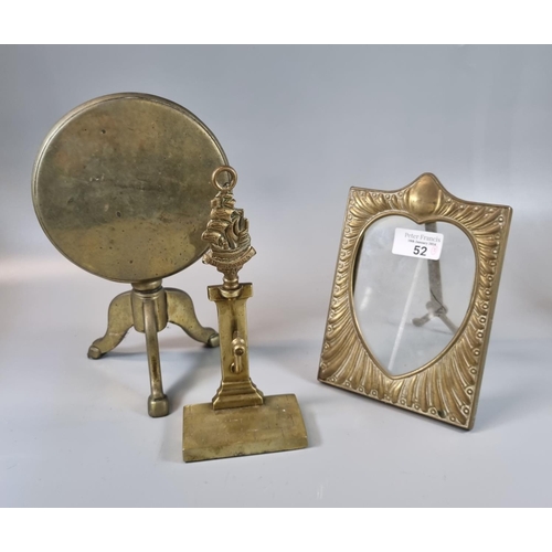 52 - Brass trivet in the form of a snap top pedestal table, a repoussé brass picture frame and brass watc... 