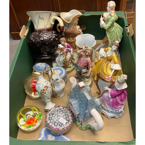 529 - Tray of assorted china to include: continental porcelain figurines, toby jugs, millefiori paperweigh... 