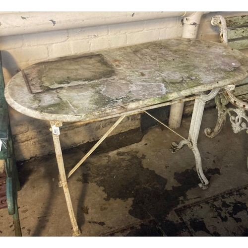 544 - D ended marble topped garden table with cast metal base.  (B.P. 21% + VAT)