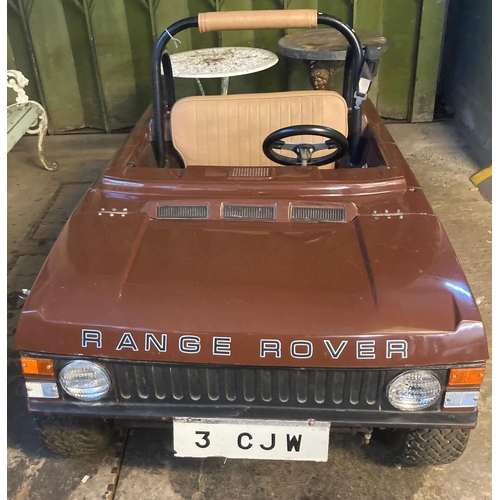 547 - Unusual and sought after 1970s Range Rover petrol powered child's car, having roll-over bar, upholst... 