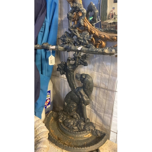 549 - Cast iron Coalbrookdale style stick stand of seated dog and a tree design together with cast metal s... 