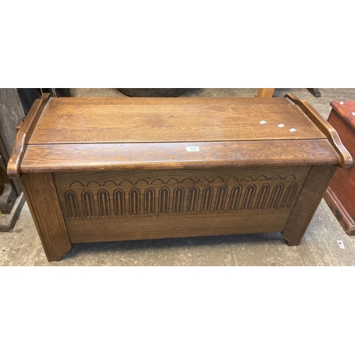 552 - Well made modern solid oak coffer with arcaded moulding and pegged hinged top.  (B.P. 21% + VAT)