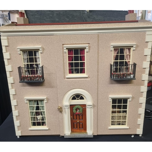 558 - Good quality and well made collector's doll's house in the form of a Georgian residence with parapet... 