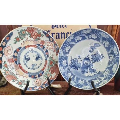 79 - Japanese Imari porcelain charger together with another Japanese blue and white porcelain charger/sha... 