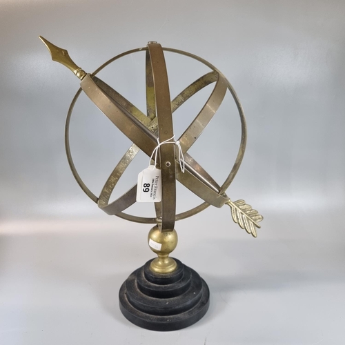 89 - Brass armillary sphere on circular stepped base. 
(B.P. 21% + VAT)