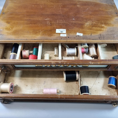 91 - Vintage Brook's Glacethread advertising sewing cabinet marked 'Sewing cottons', the two drawers with... 