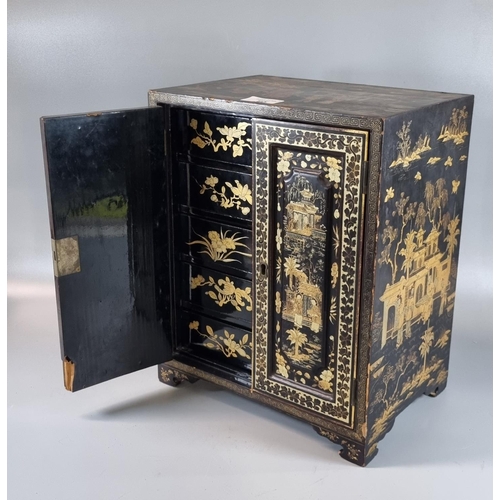 95 - Early 20th Century Chinese chinoiserie lacquered table top cabinet, the interior revealing five draw...
