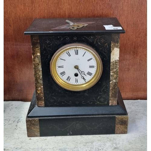 98 - Late 19th century black slate and marble mantle clock with white enamelled Roman face.  Single train... 