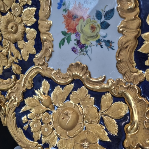 1 - Meissen porcelain bowl with cobalt blue ground and gilt relief floral and foliate decoration, the ce... 
