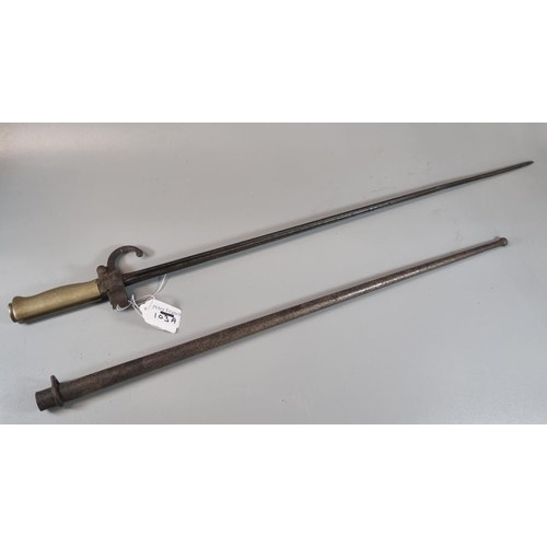 103A - 19th century French Lebel bayonet with cruciform blade and brass hilt, metal scabbard.  65cm long ap... 