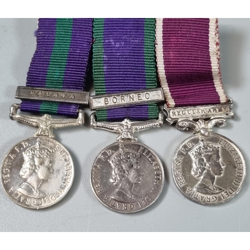 114 - Queen Elizabeth II medal group to include: General Service medal with clasp for Malaya, Campaign Ser... 