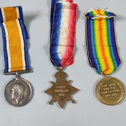 124 - WWI medal trio to include: 1914-15 Star, 1914-18 War Medal and 1914-19 Victory Medal awarded to L 33... 