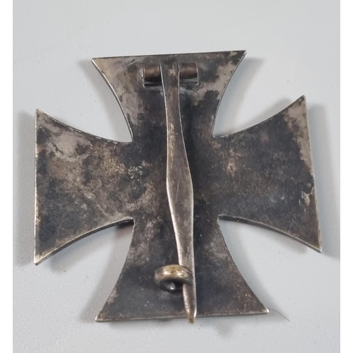 141 - WWII period German Iron Cross first class in original fitted box. Together with another replica badg... 