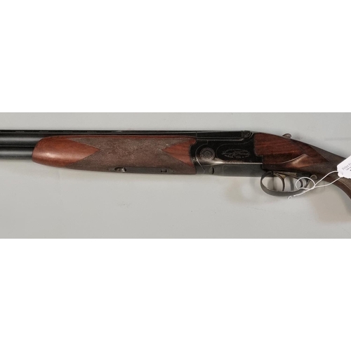 177 - Luigi Franchi 12 bore double barrelled over and under ejector shotgun with chequered semi pistol gri... 